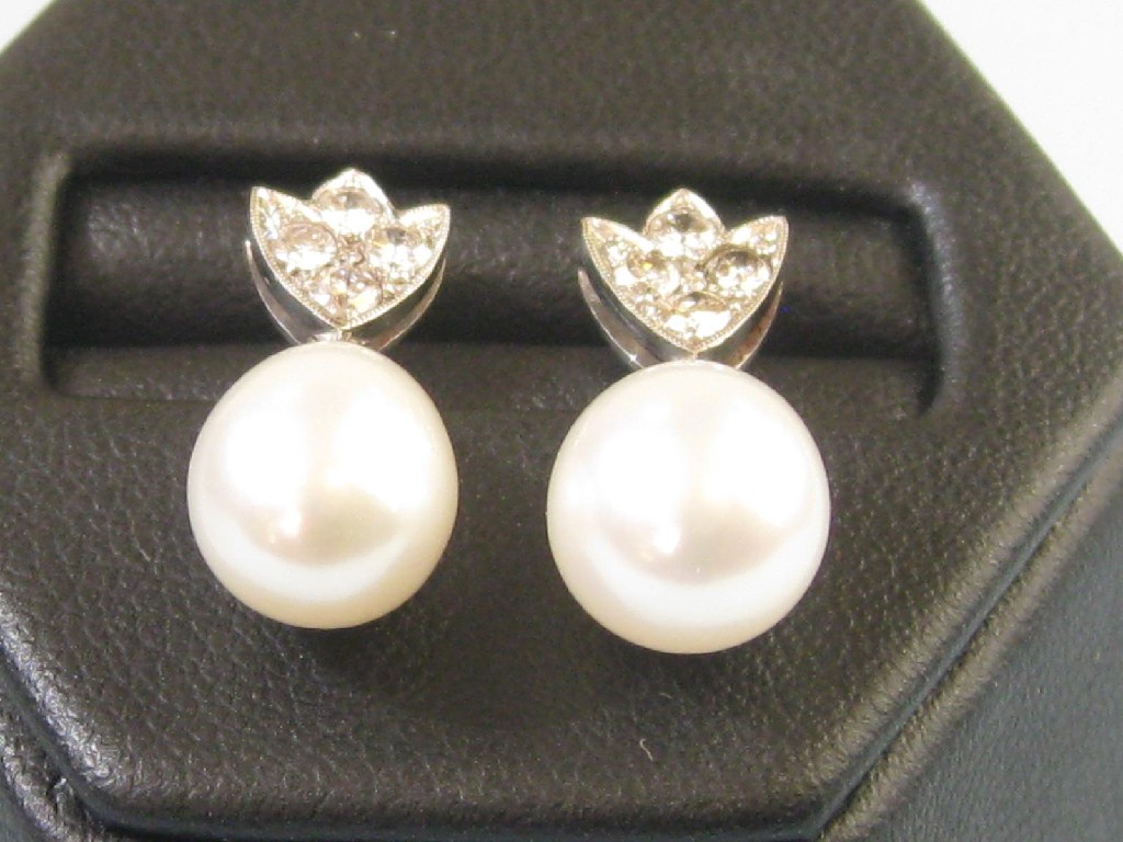 Appraisal: A pair of Pearl and Diamond Earrings each with drop