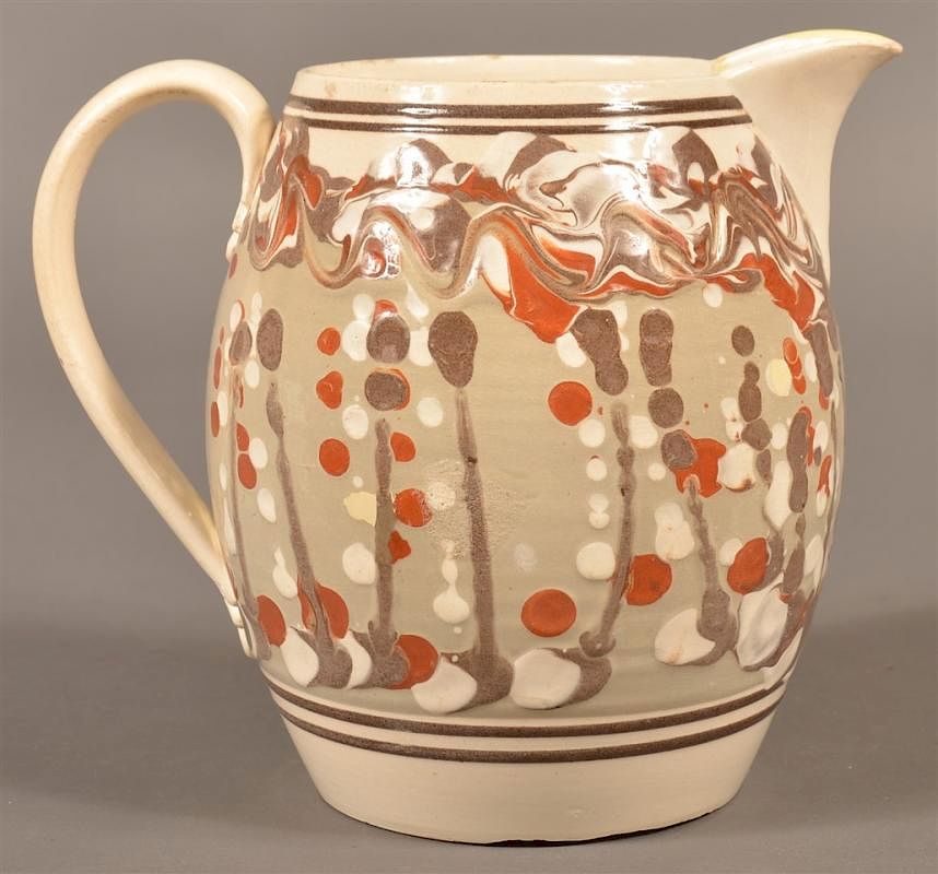 Appraisal: Cat's Eye Drip Mocha China Barrel Form Pitcher Cat's Eye