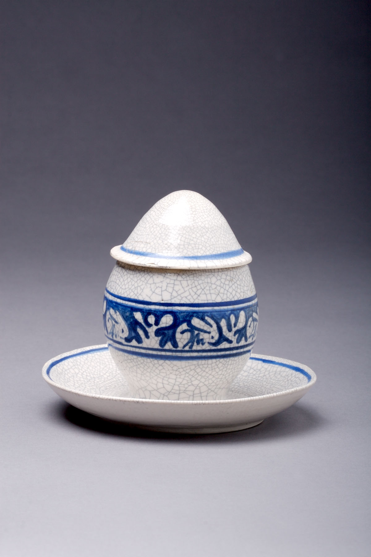 Appraisal: DEDHAM POTTERY 'RABBIT TWO EAR ' PATTERN EGG CUP AND