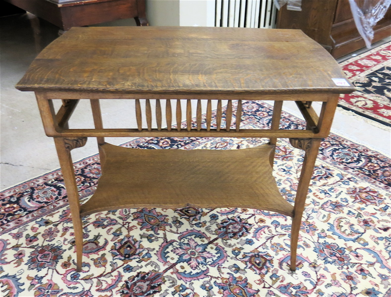 Appraisal: A RECTANGULAR OAK PARLOR TABLE American c a -tier design