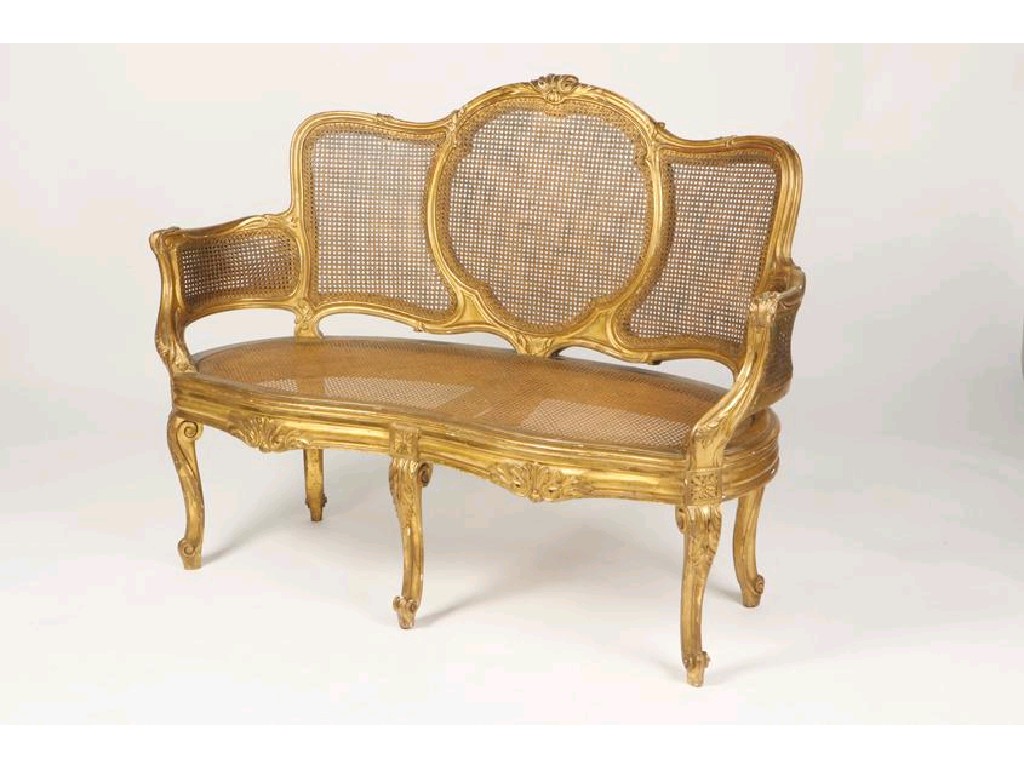 Appraisal: A LOUIS XV STYLE GILTWOOD LOVE SEAT with caned back