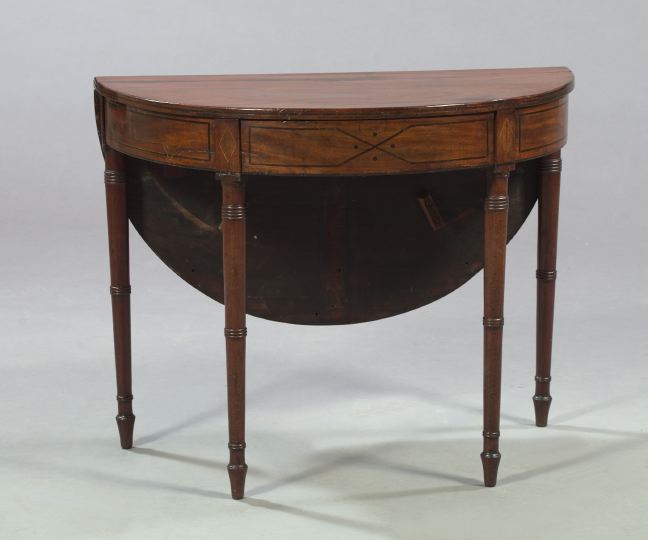 Appraisal: Regency-Style Mahogany Drop-Leaf Table late th century the bowed top