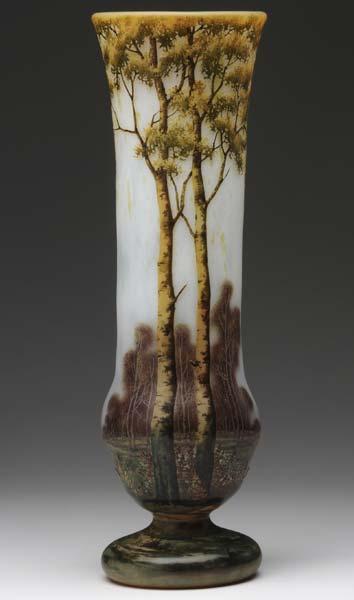 Appraisal: DAUM Tall footed vase with acid-cut and enameled forest scene