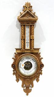 Appraisal: English aneroid barometer English aneroid barometer executed in oak having