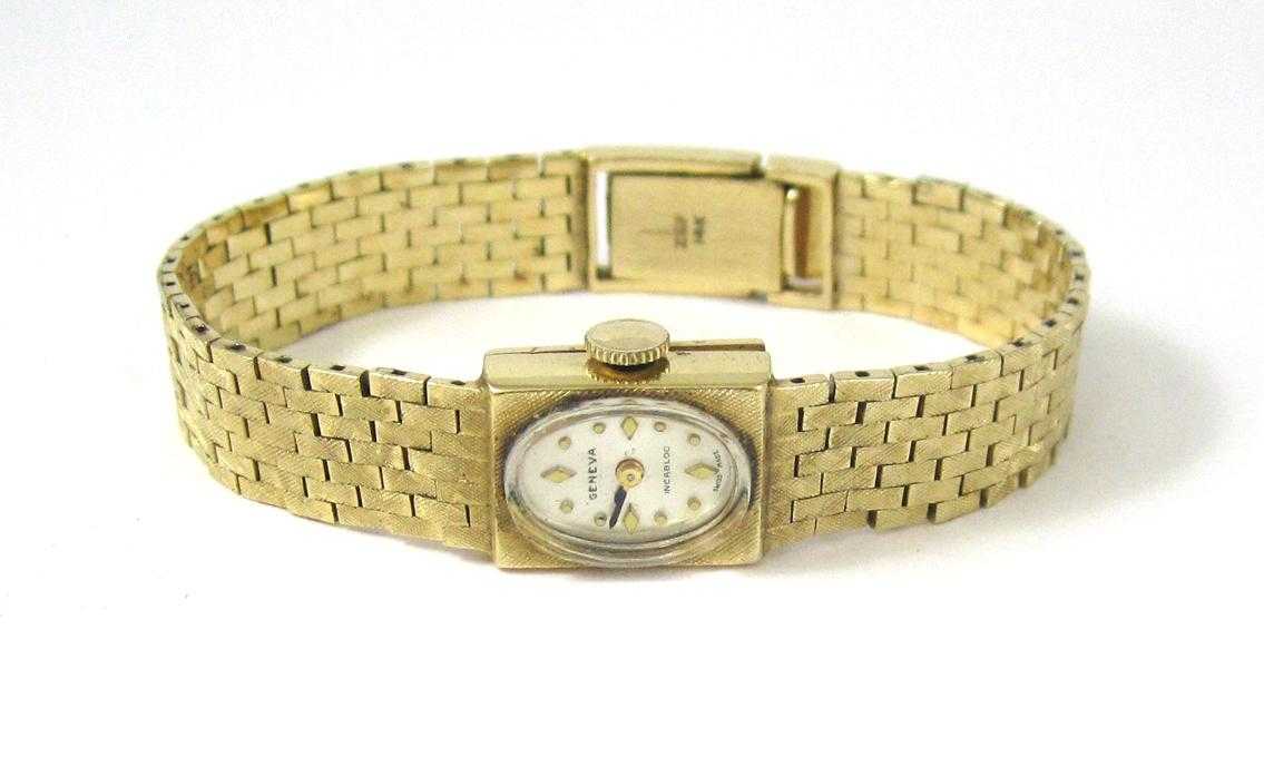 Appraisal: LADY'S FOURTEEN KARAT GOLD WRIST WATCH featuring a Swiss -jewel