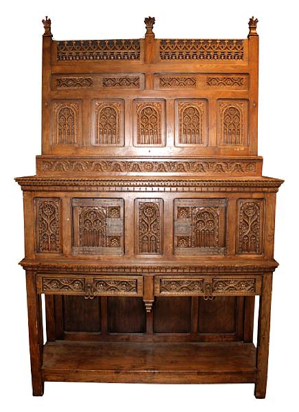 Appraisal: A French Gothic Revival carved oak side cupboard height in