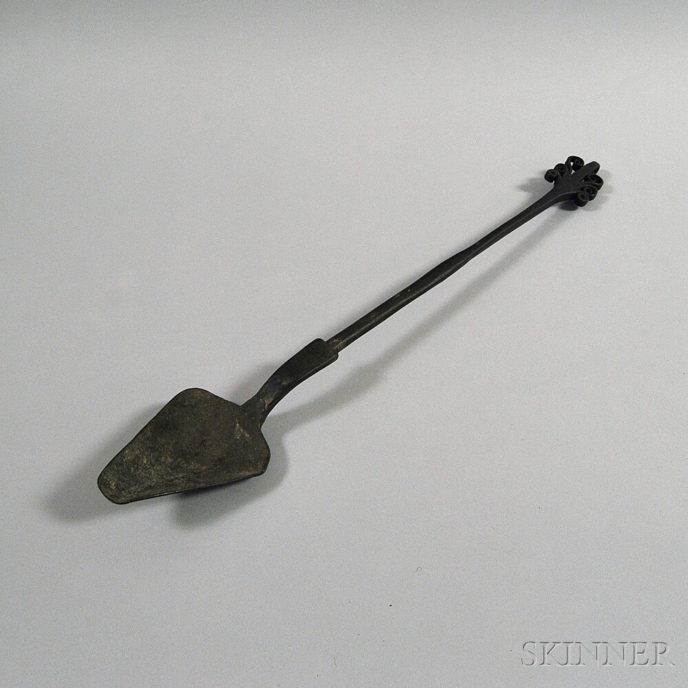 Appraisal: Large Wrought Iron Tasting Spoon th century the handle with