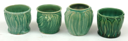 Appraisal: MEL-ROSE WARE Victoria circa Four small earthenware vases applied with