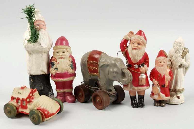 Appraisal: Lot of Christmas Decorations Description Includes four celluloid Santas one