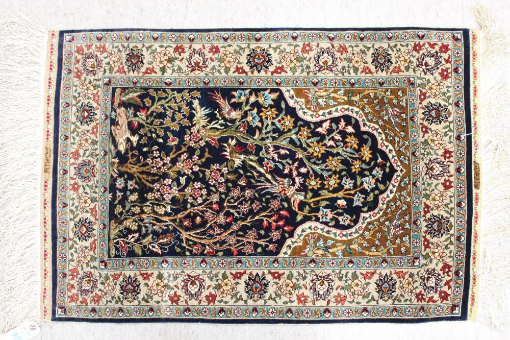 Appraisal: PERSIAN SILK PRAYER RUG floral pattern on royal blue ground