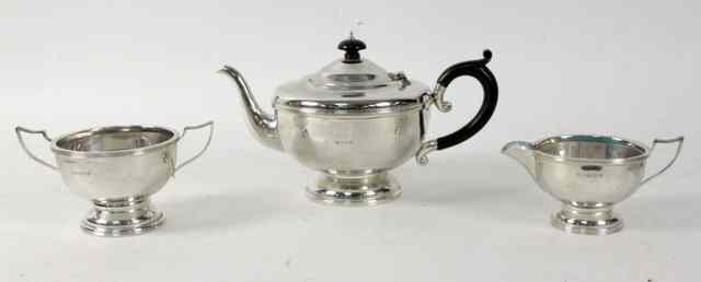 Appraisal: A silver three piece tea service Birmingham comprising a circular