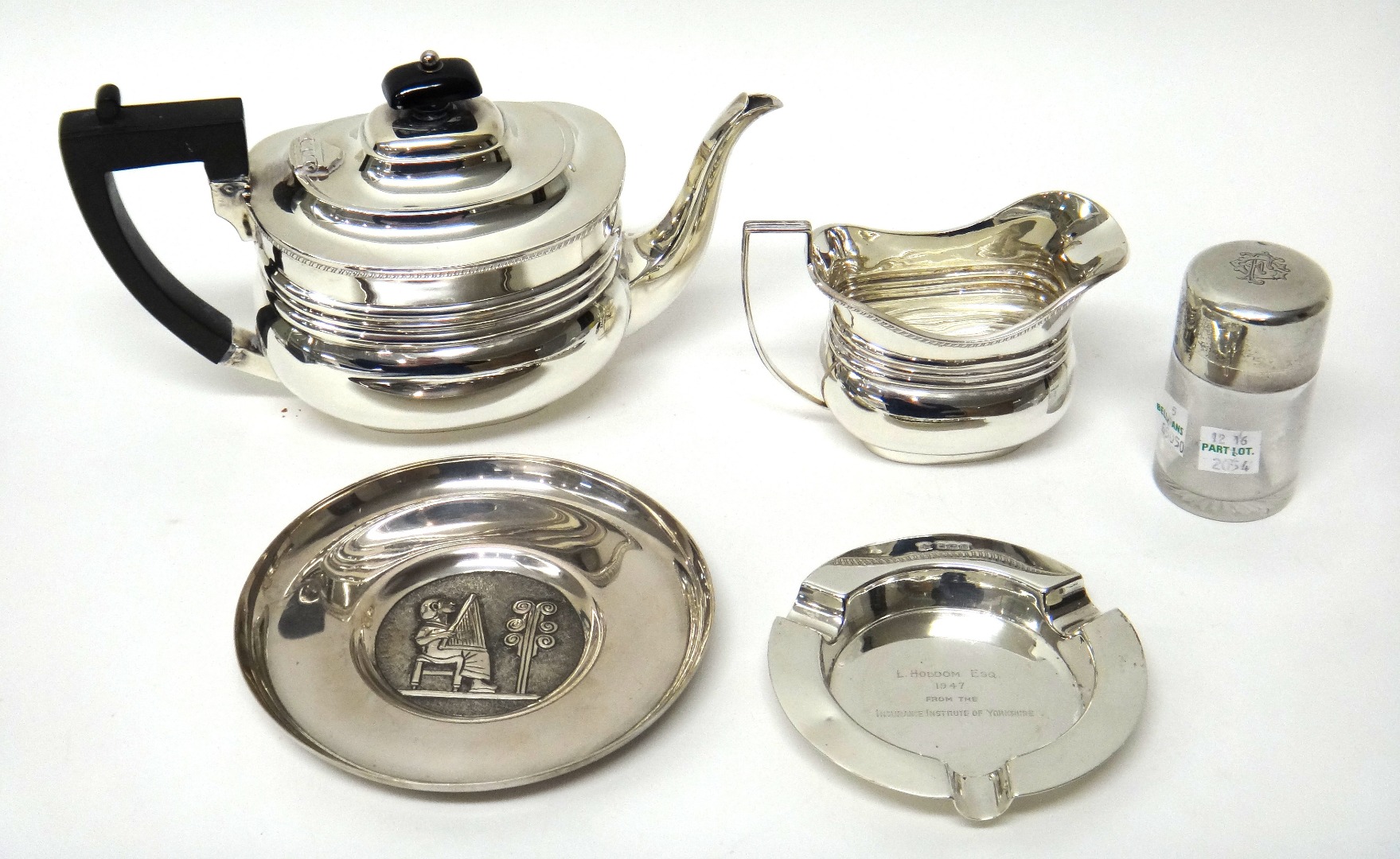 Appraisal: Silver comprising a Victorian teapot and a matching milk jug