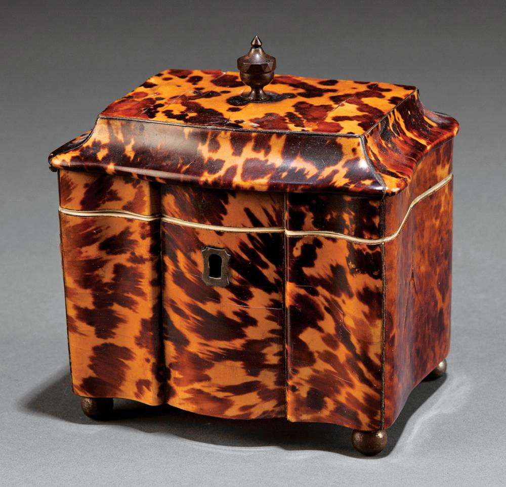 Appraisal: George III Sarcophagus-Form Tortoiseshell Tea Caddy c lidded interior compartment