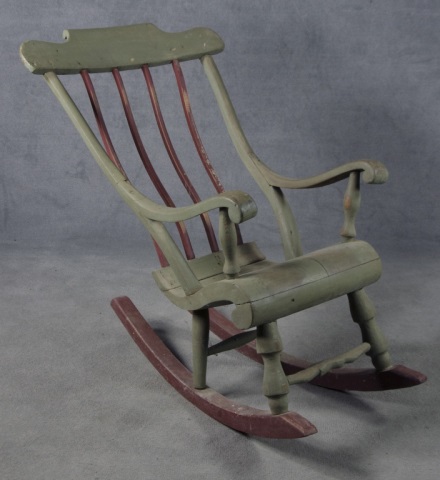 Appraisal: Primitive Paint-Decorated Rocker th century Shaped seat and arms with