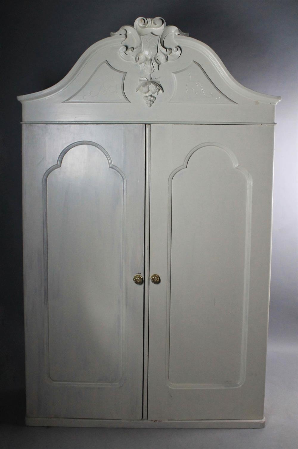 Appraisal: VINTAGE CREAM PAINTED ARMOIRE arched pediment with central shield foliate