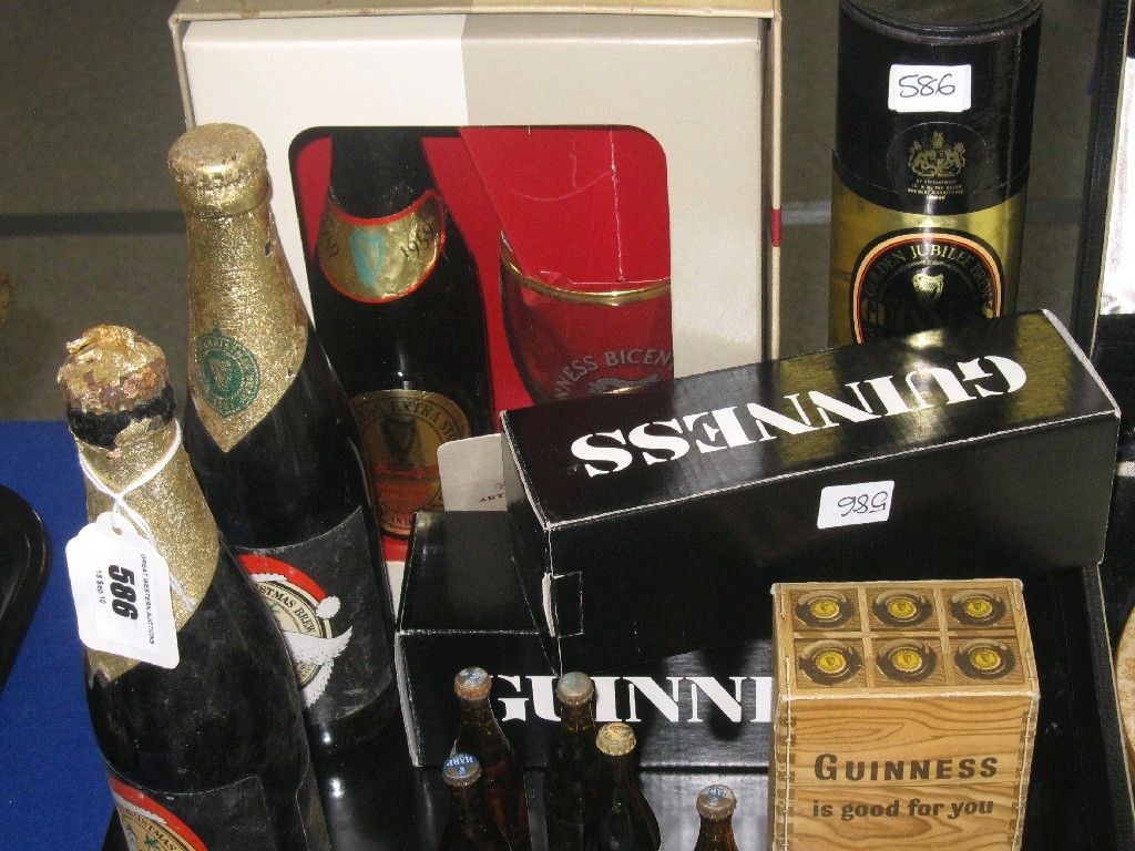 Appraisal: Tray lot of assorted Guinness bottles and miniature Harp Lager