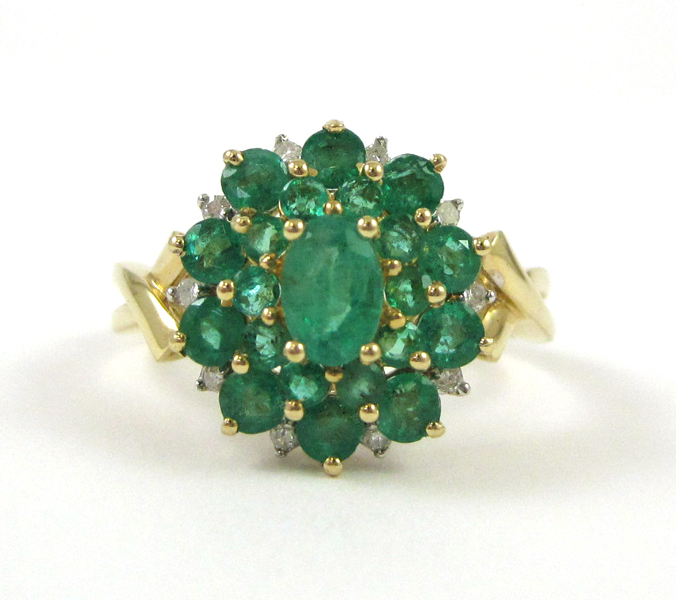 Appraisal: FOURTEEN KARAT GOLD DIAMOND AND EMERALD RING twenty round-cut emeralds