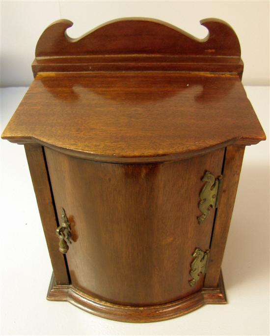 Appraisal: Early th century mahogany desk cupboard the hinged door enclosing