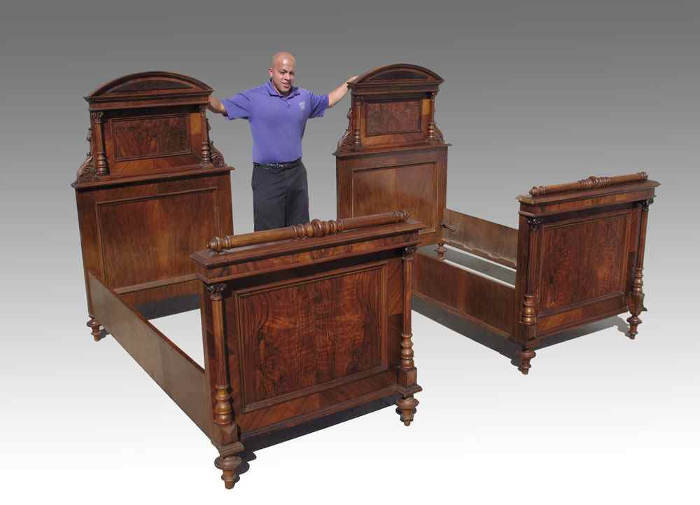 Appraisal: PAIR TH CENTURY MAHOGANY BEDS Carved full columns and foliate