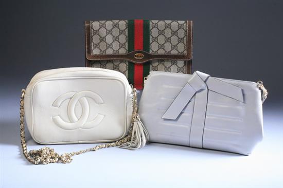 Appraisal: THREE DESIGNER HANDBAGS Including a Chanel cream colored quilted leather