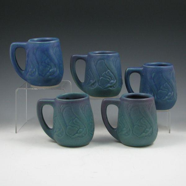 Appraisal: Five Van Briggle floral mugs in purple and blue glaze