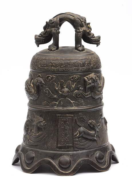 Appraisal: A Chinese bronze domed form temple bell th Centuryornamented with