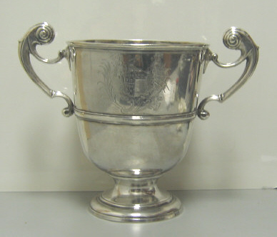 Appraisal: JOSEPH WALKER DUBLIN - Footed and two-handled cup with applied