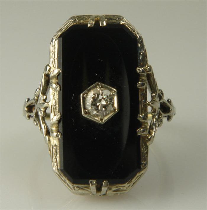 Appraisal: K WG onyx filigree ring with pt diamond size dwt