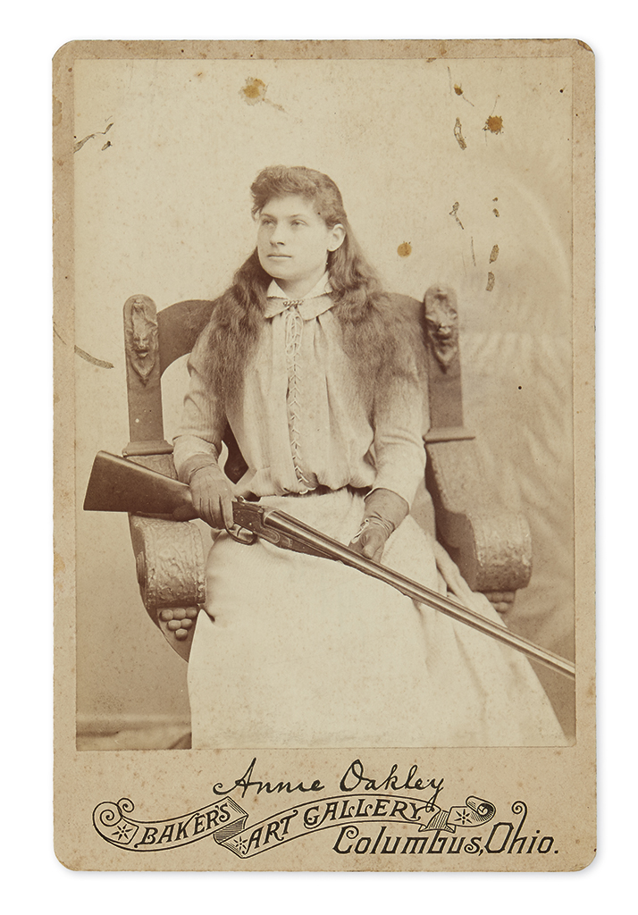 Appraisal: WEST Cabinet card of Annie Oakley and her rifle Albumen