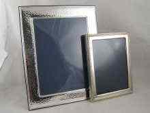 Appraisal: A large modern silver photo frame with hammered finish x