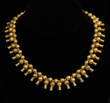 Appraisal: EARLY PERSIAN GOLD NECKLACE WITH POMEGRANATE-FORM DROPS in Provenance Property