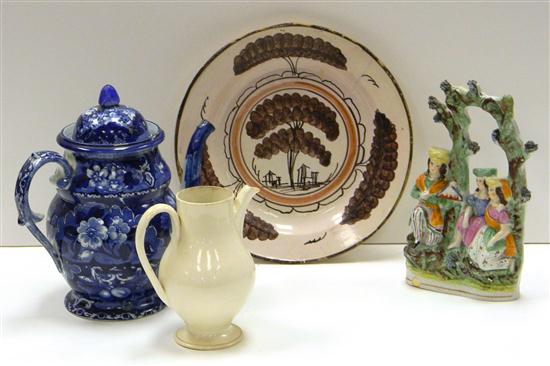 Appraisal: Pottery group including a Staffordshire piece of a man and