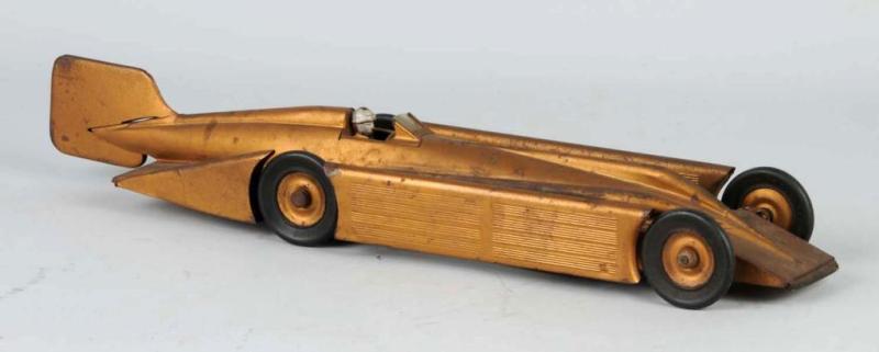 Appraisal: Pressed Steel Kingsbury Golden Arrow Race Car Toy Description American