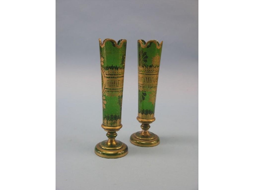 Appraisal: A pair of th century green glass vases tapering cylindrical