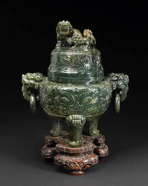 Appraisal: A large 'spinach' jade covered censer Republic Period Of tripod