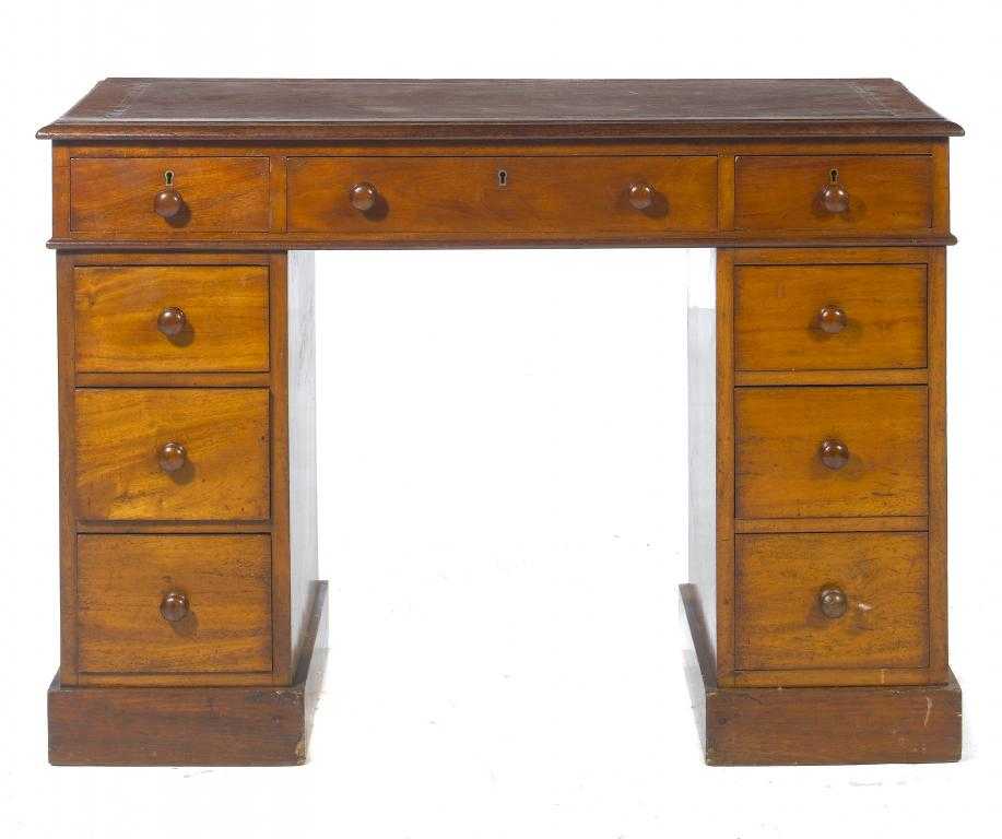 Appraisal: A VICTORIAN MAHOGANY DESK the nine drawers with original knobs