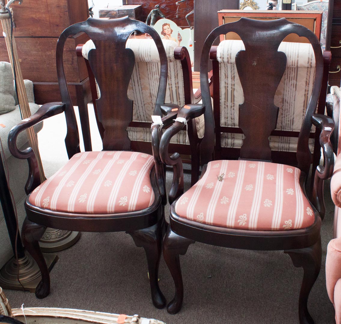 Appraisal: Pair of upholstered mahogany armchairs