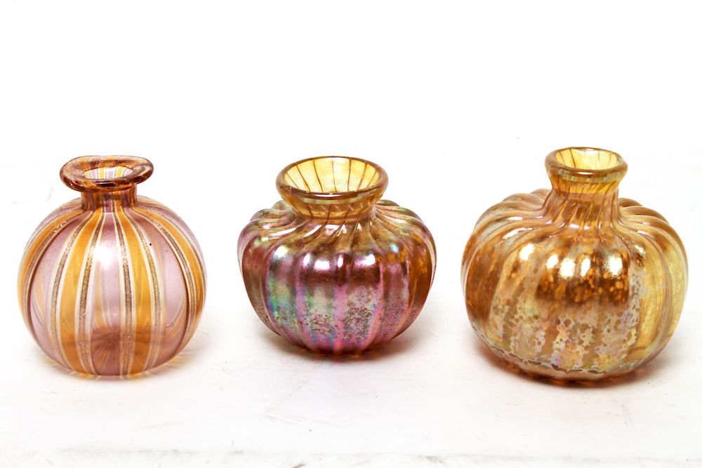 Appraisal: Iridescent Art Glass Small Vases Group of Group of three