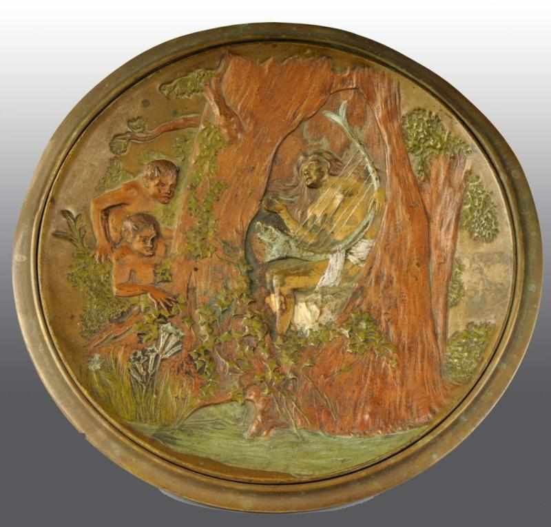 Appraisal: Brass Pedestal Plate Description Raised figural decoration of children with