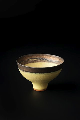 Appraisal: Lucie Rie Austria - Footed bowlin yellow glaze and with