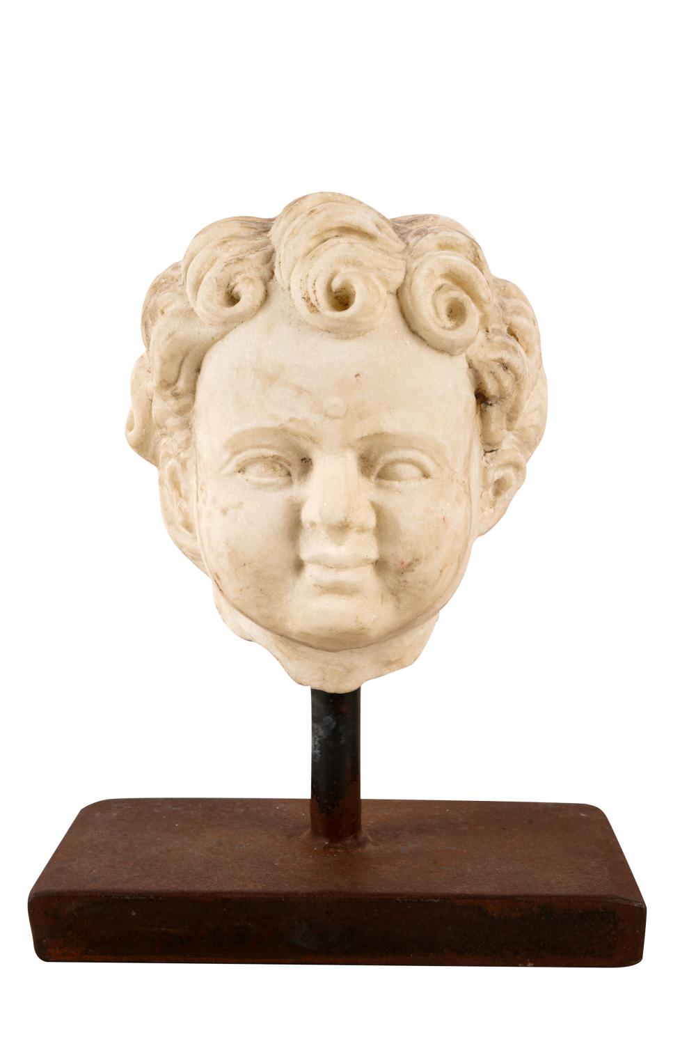 Appraisal: CARVED MARBLE HEADmodeled after the antique on a cast iron