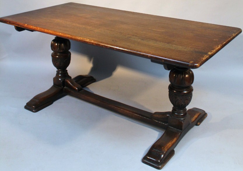 Appraisal: A thC Jacobean style oak refectory table with a rounded