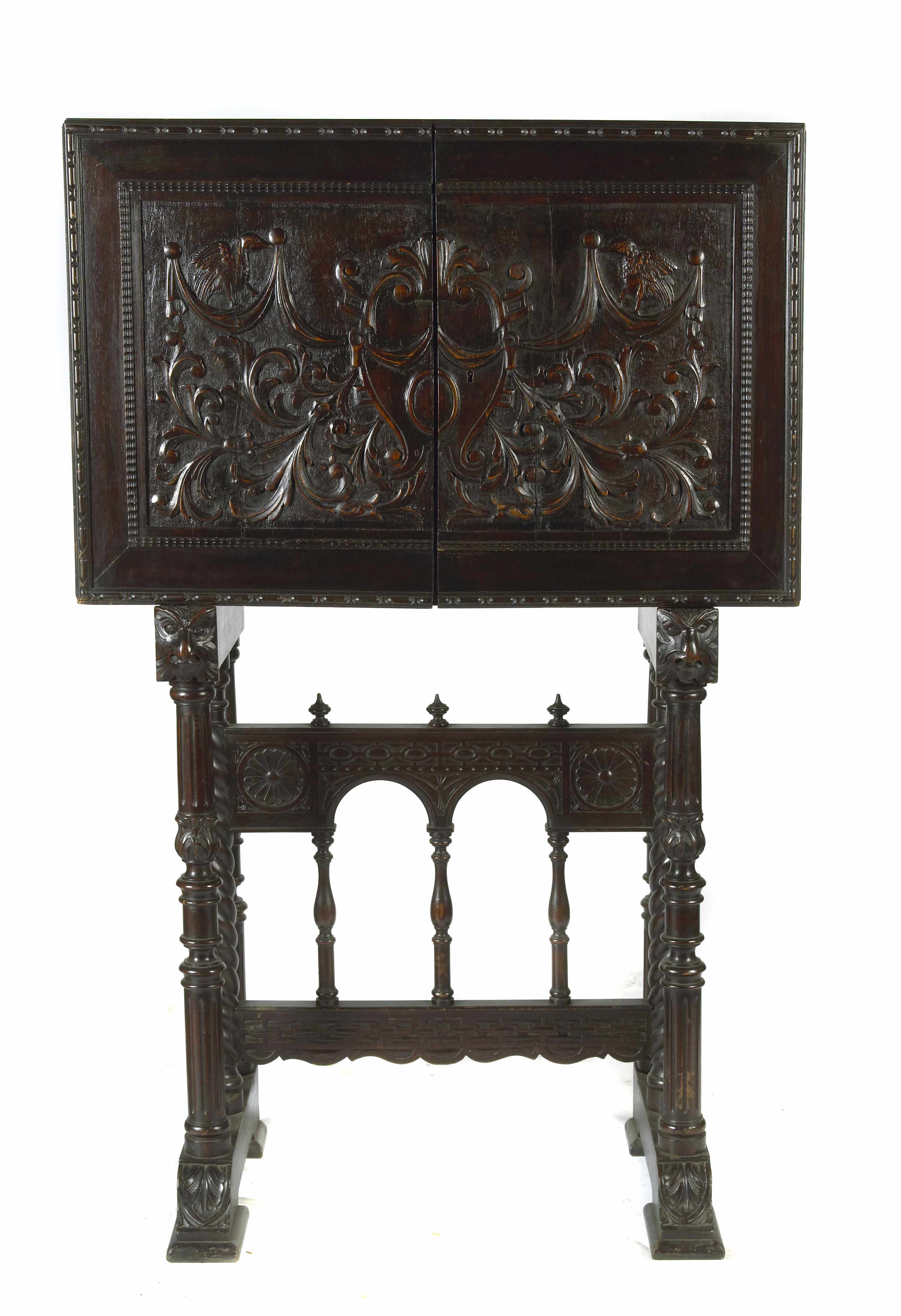 Appraisal: Property of various owners A Spanish Renaissance style oak cabinet