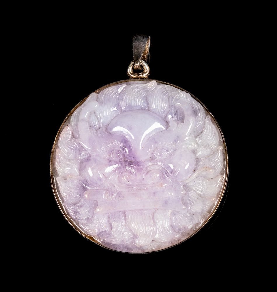 Appraisal: A Chinese Lavender and Pale Celadon Jadeite Circular Pendant Diam