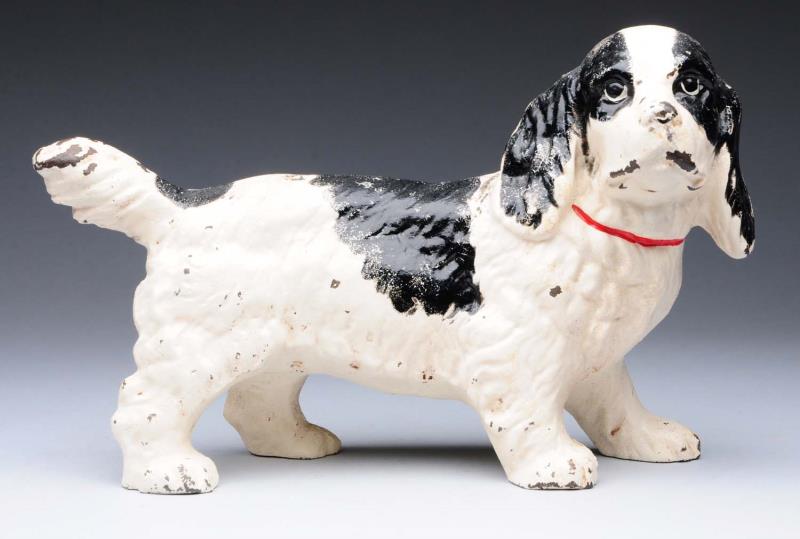 Appraisal: Cast Iron Cocker Spaniel Dog Doorstop Made by Hubley cat