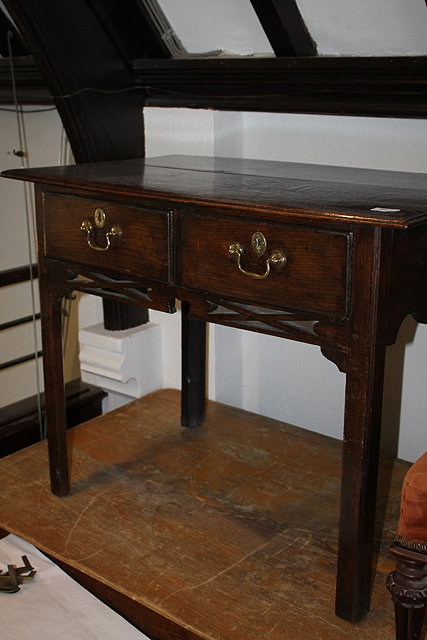 Appraisal: A TH CENTURY OAK SIDE TABLE fitted two drawers on