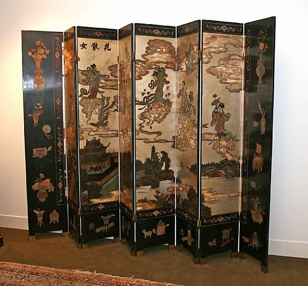 Appraisal: A black ground eight-panel coromandel screen th Century Carved to