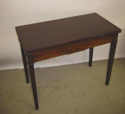 Appraisal: A GEORGE III MAHOGANY FOLDING TEA TABLE of oblong form