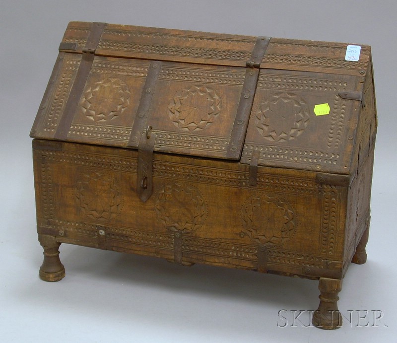 Appraisal: Middle Eastern Iron-bound Carved Hardwood Peaked-top Footed Storage Box ht