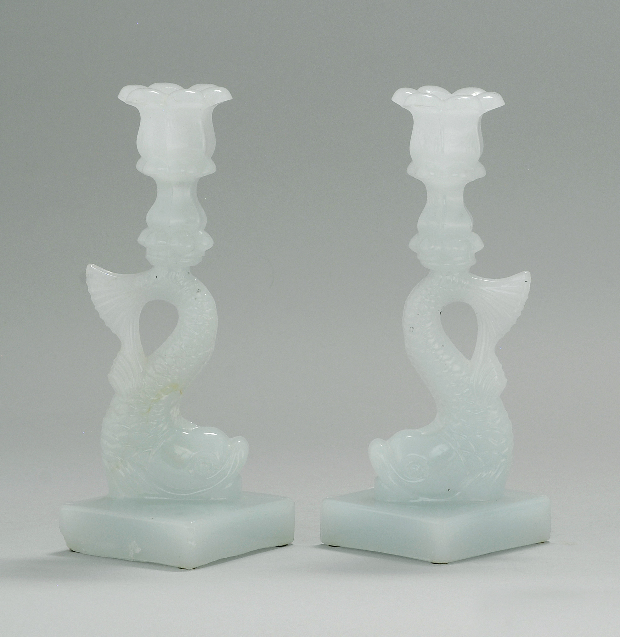 Appraisal: PAIR OF SANDWICH GLASS DOLPHIN-FORM CANDLESTICKS th CenturyIn clambroth Single